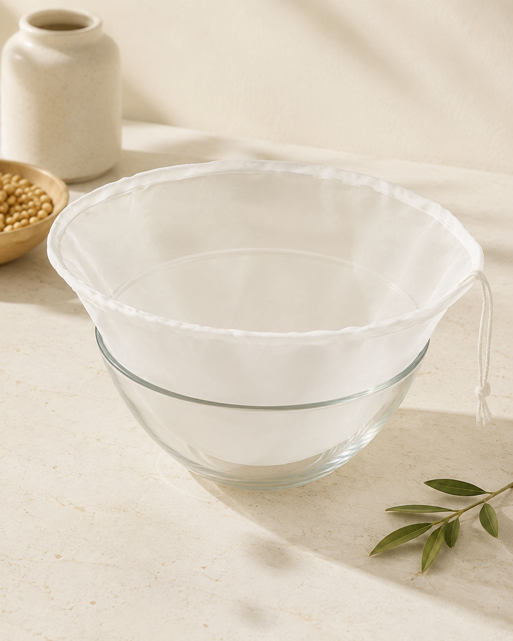 Keynari mesh strainer bag in a glass bowl